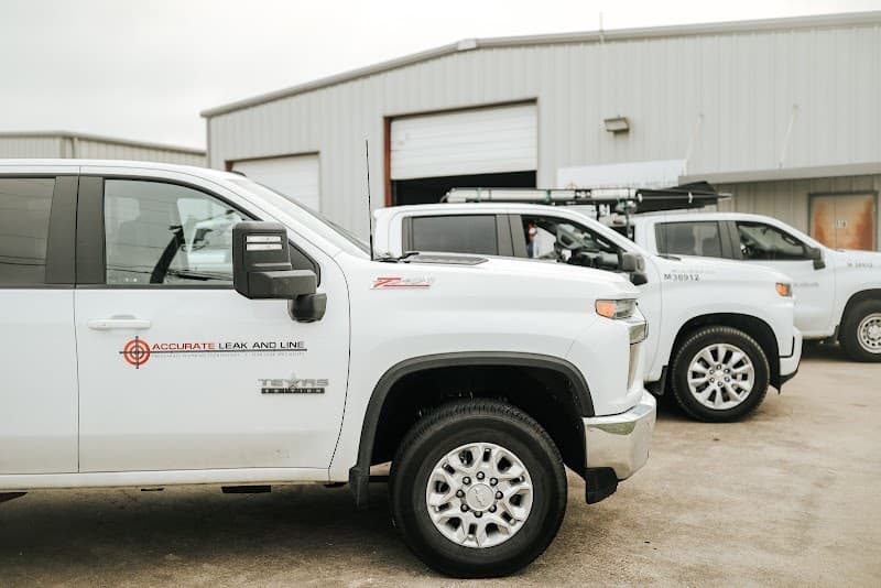 Licensed plumber performing sewer line inspection