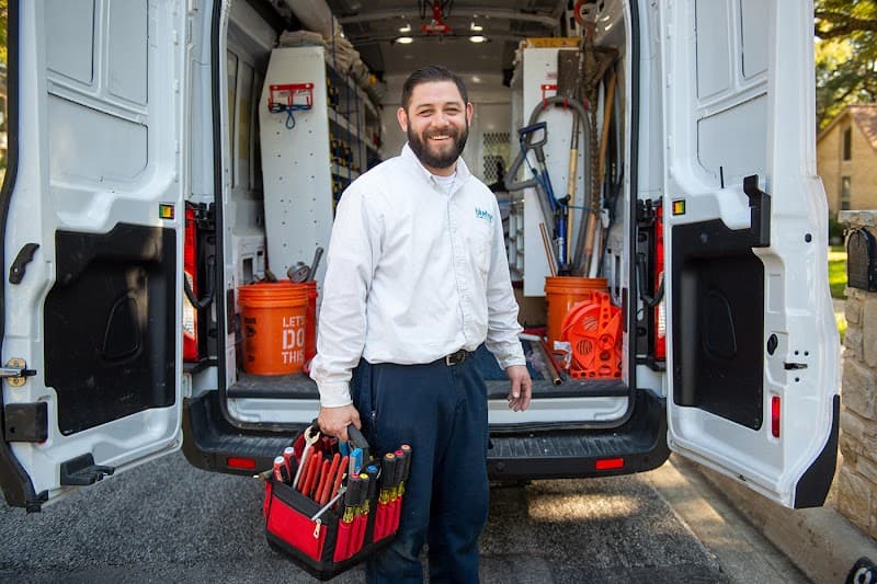 Plumbing team on residential job site