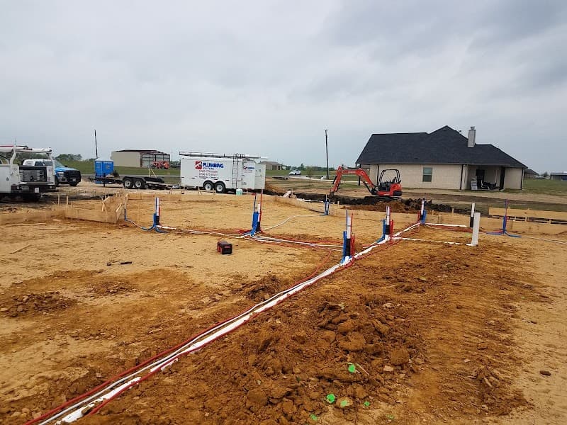 Licensed plumber performing sewer line inspection