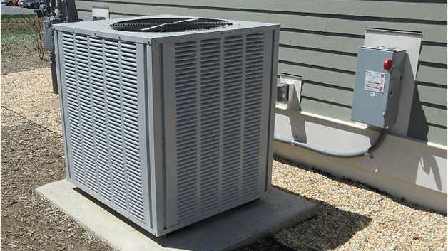 Licensed plumber performing sewer line inspection