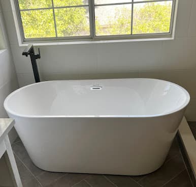 Plumbing team on residential job site