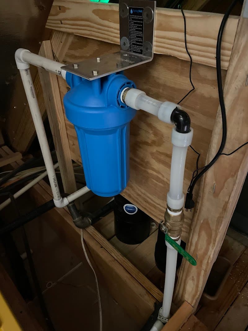 Licensed plumber performing sewer line inspection