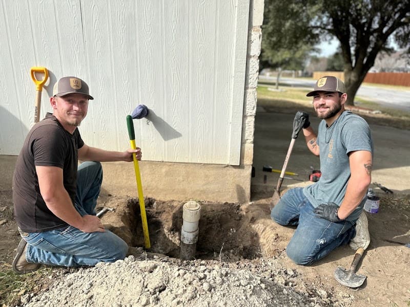 Plumbing team on residential job site