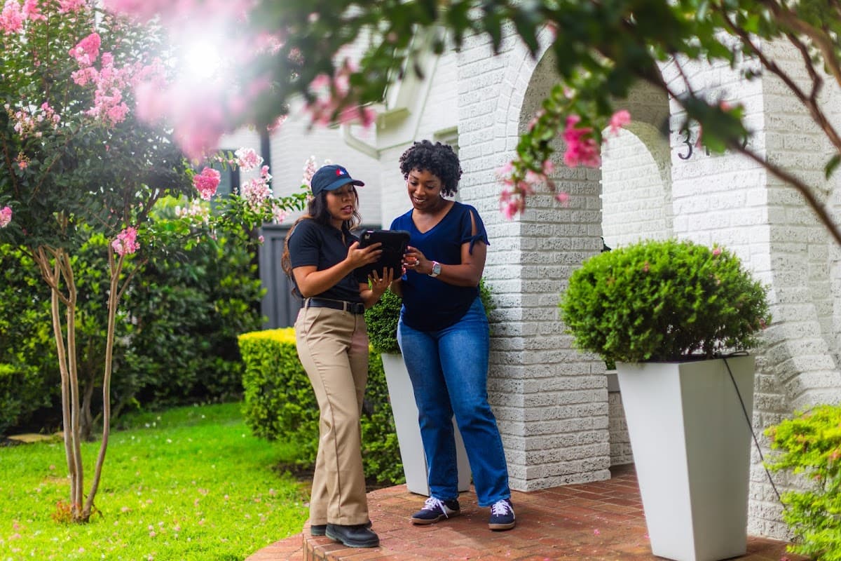 Licensed plumber performing sewer line inspection